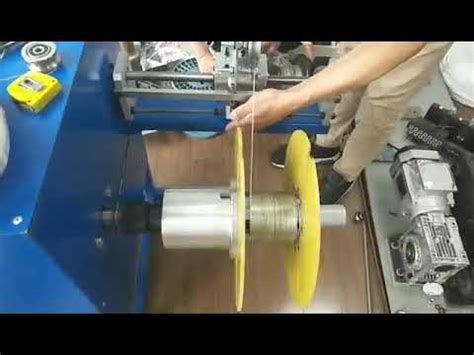 comCable spool dereeller, work together with w. . Guy caught in wire spooling machine